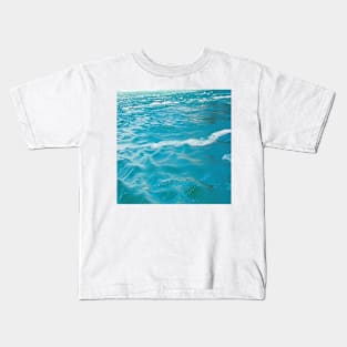 Living Waters in light blue ocean waves and ripples Kids T-Shirt